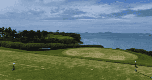Challenging par 3 tee shot over the sea hazard at Pine Beach CC.